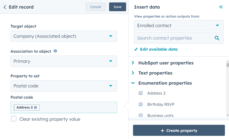 Screenshot of HubSpot's 'Edit record' action in a workflow with a dropdown menu set to 'Postal code' and the 'Address 2' field selected. The enrolled contact is selected to copy data from.